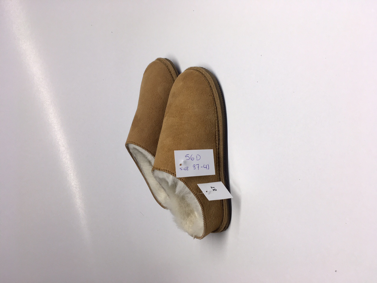 Zapatilla de piel de cordero